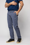 angle hover:  Rowan Tapered Trouser Overcast Twill  Man wears grey and blue trouser pant