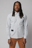angle hover: Oxford Ticking Stripe: Man wears white oxford buttonup in ticking stripe