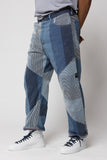 angle: Rowan Pointalist Denim Stripe  Man wears denim jean pant with patchwork in blue