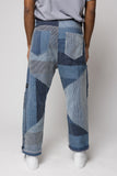 angle: Rowan Pointalist Denim Stripe  Man wears denim jean pant with patchwork in blue