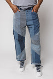 angle hover: Rowan Pointalist Denim Stripe  Man wears denim jean pant with patchwork in blue