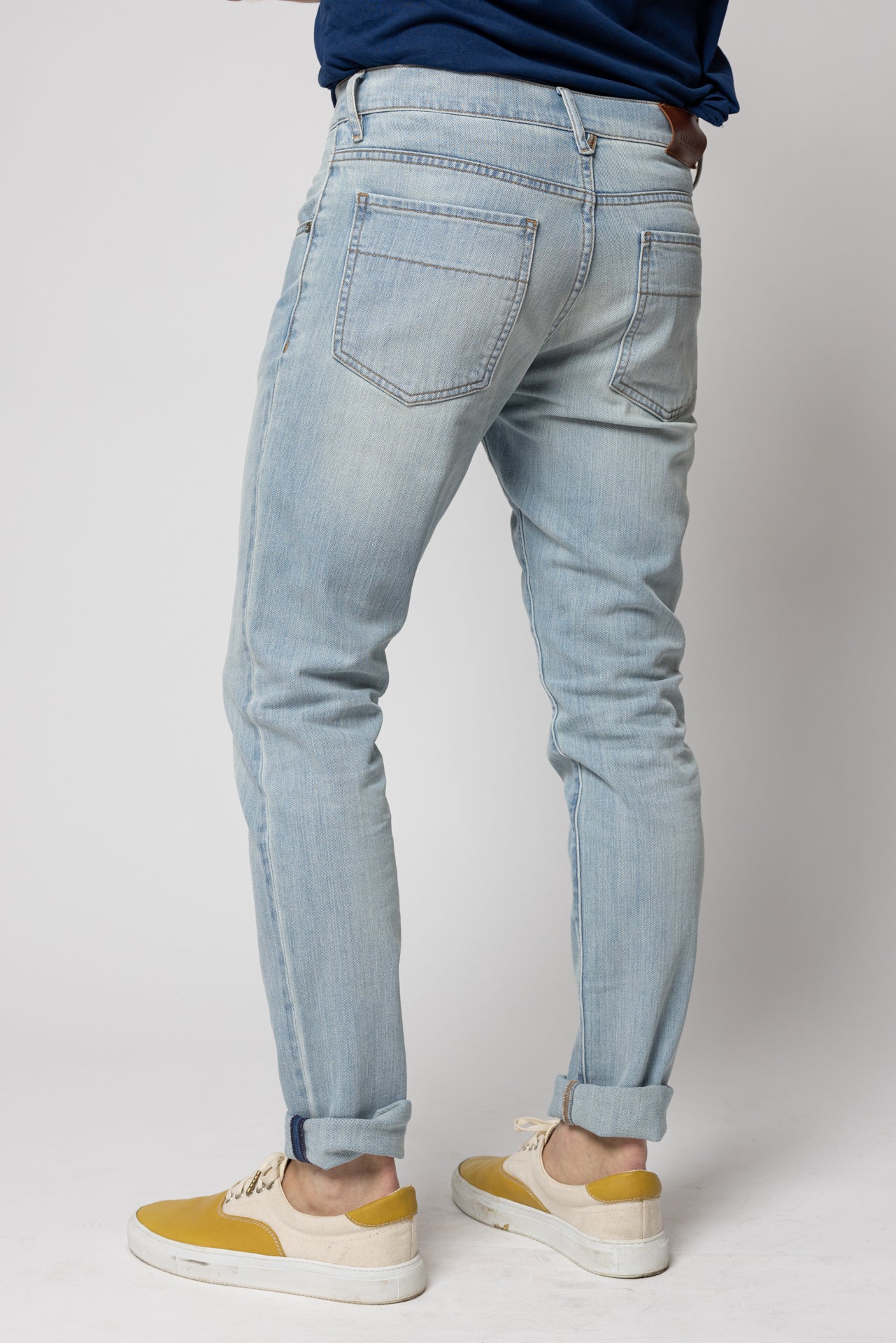 angle: Martin Lookout Man wearing light blue denim jean in Martin Lookout