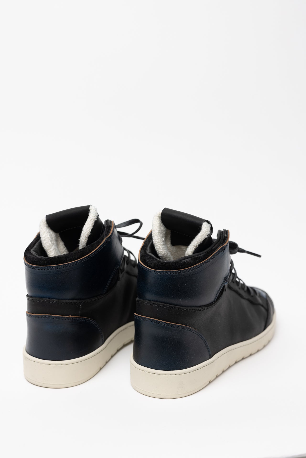 angle: Black Horween/Navy Chromexcel  black high top basketball shoes with black and blue leather