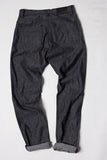 angle: Alexander Denim Tweed Man wears a Raleigh Workshop denim jean pant in tweed